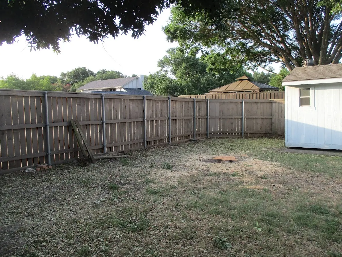 Cleared yard after professional tree removal in Wilburton